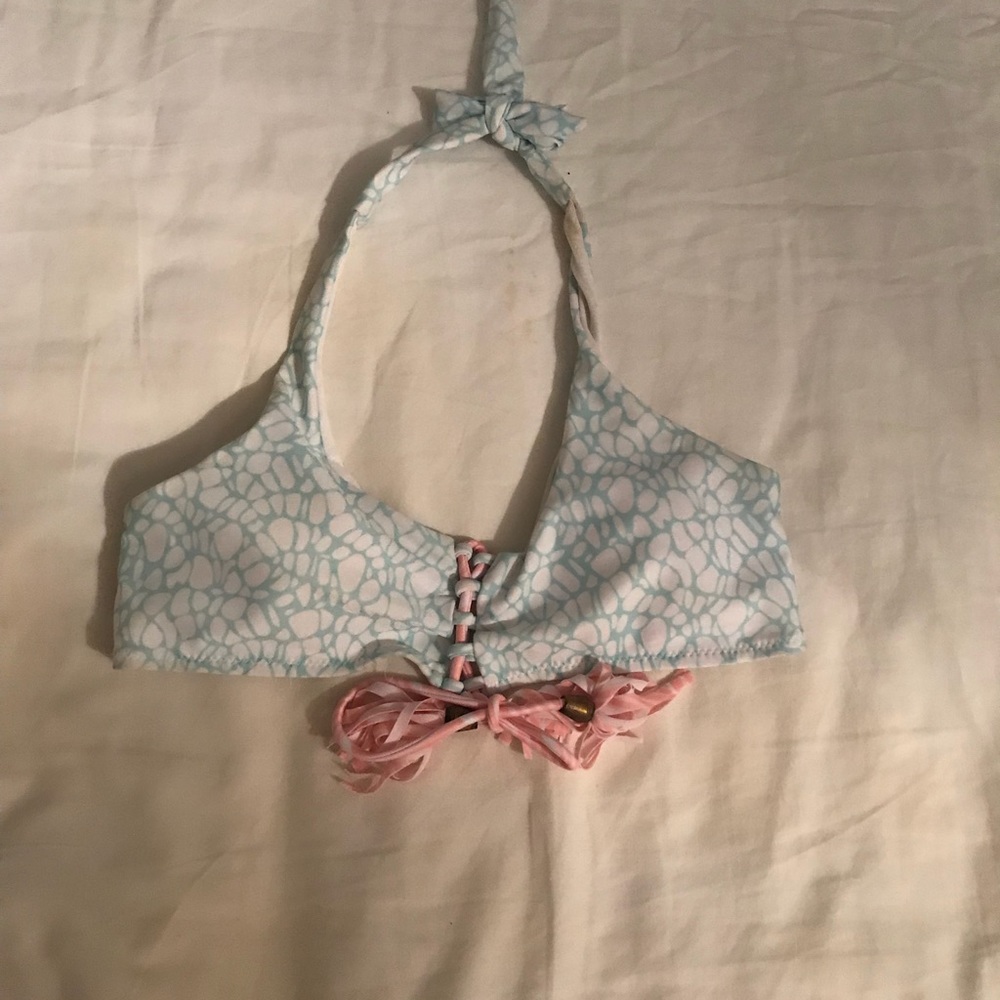 Light blue and pink lace up bikini top.Never worn.
